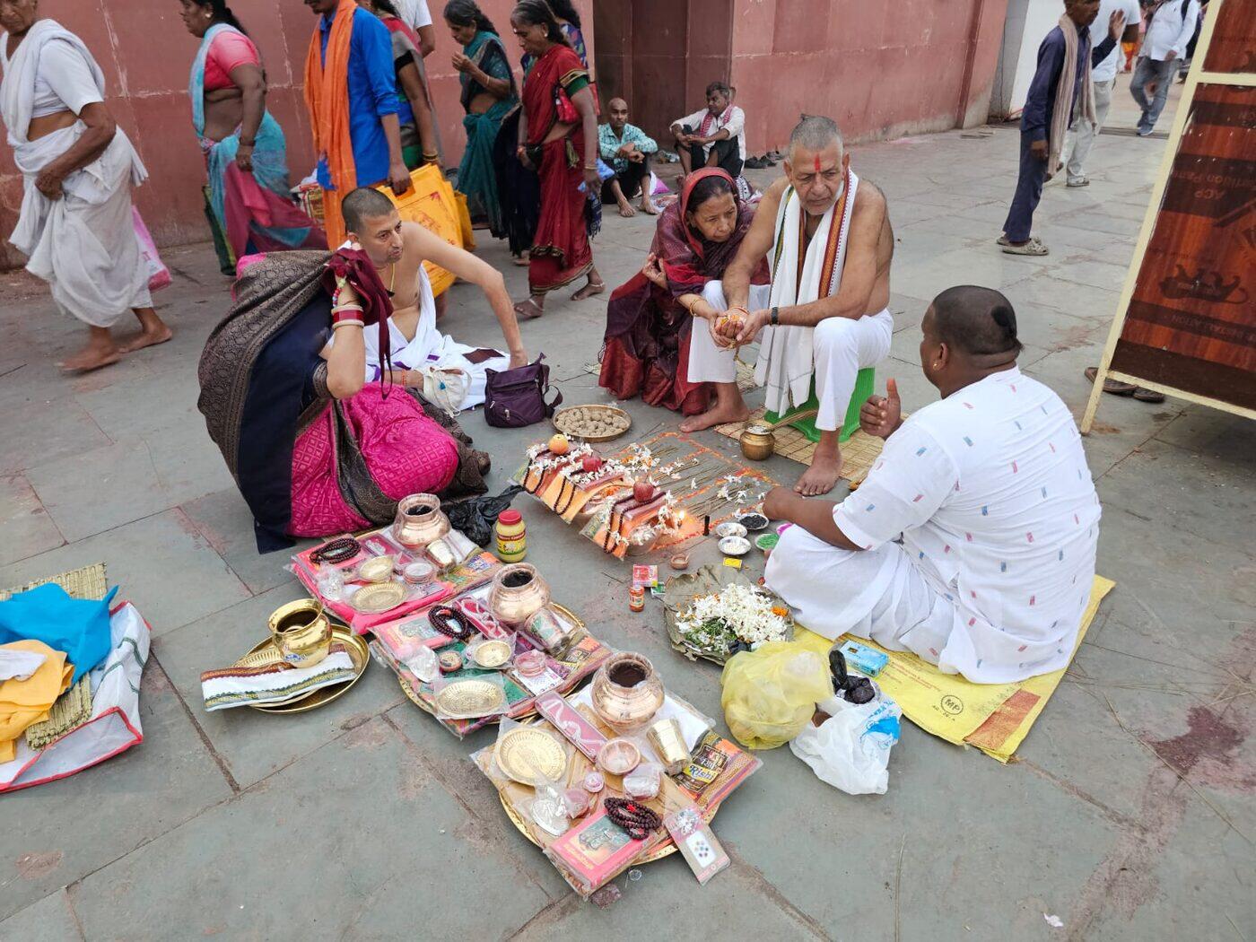 Ritual performed in a Krishna-tiled temple chamber